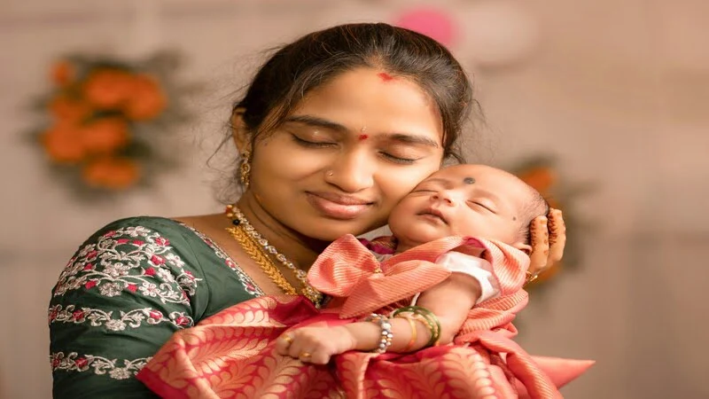 Parent Soothing a Crying Newborn